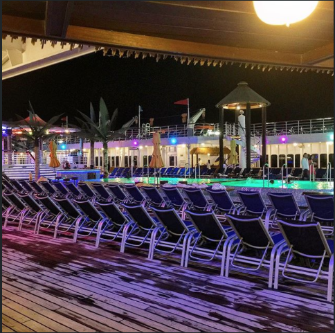 CarnivalCruise's tweet photo. A pool this bright shines a little bit brighter at night. #ArentWeRight? https://t.co/BKccj1jSod