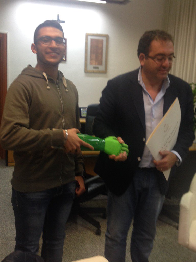 Ana_fmd's tweet photo. Gabriele Caiazzo #HandyHand receives award from Mayor Testa #Aprilia @fmdigitale @microsoftitalia @MirtaMichilli https://t.co/VOjU0GIhJR
