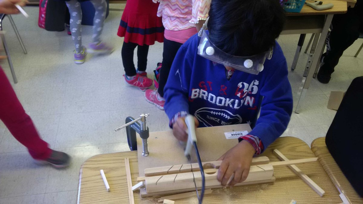 Eduneering's tweet photo. Slow and steady. Let the #saw do the work. Sameer in #Grade2 in the Tech-Know-Kids lab. The #mitrebox helps to hold. https://t.co/1qxIoTdEFb
