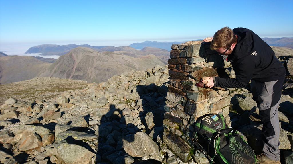 NTScafellpike's tweet photo. Day spent clearing vandalism off Scafell Pike summit cairn@nationaltrust @fixthefells #betterthings2do #unimpressed https://t.co/gRqBgPGp3Q