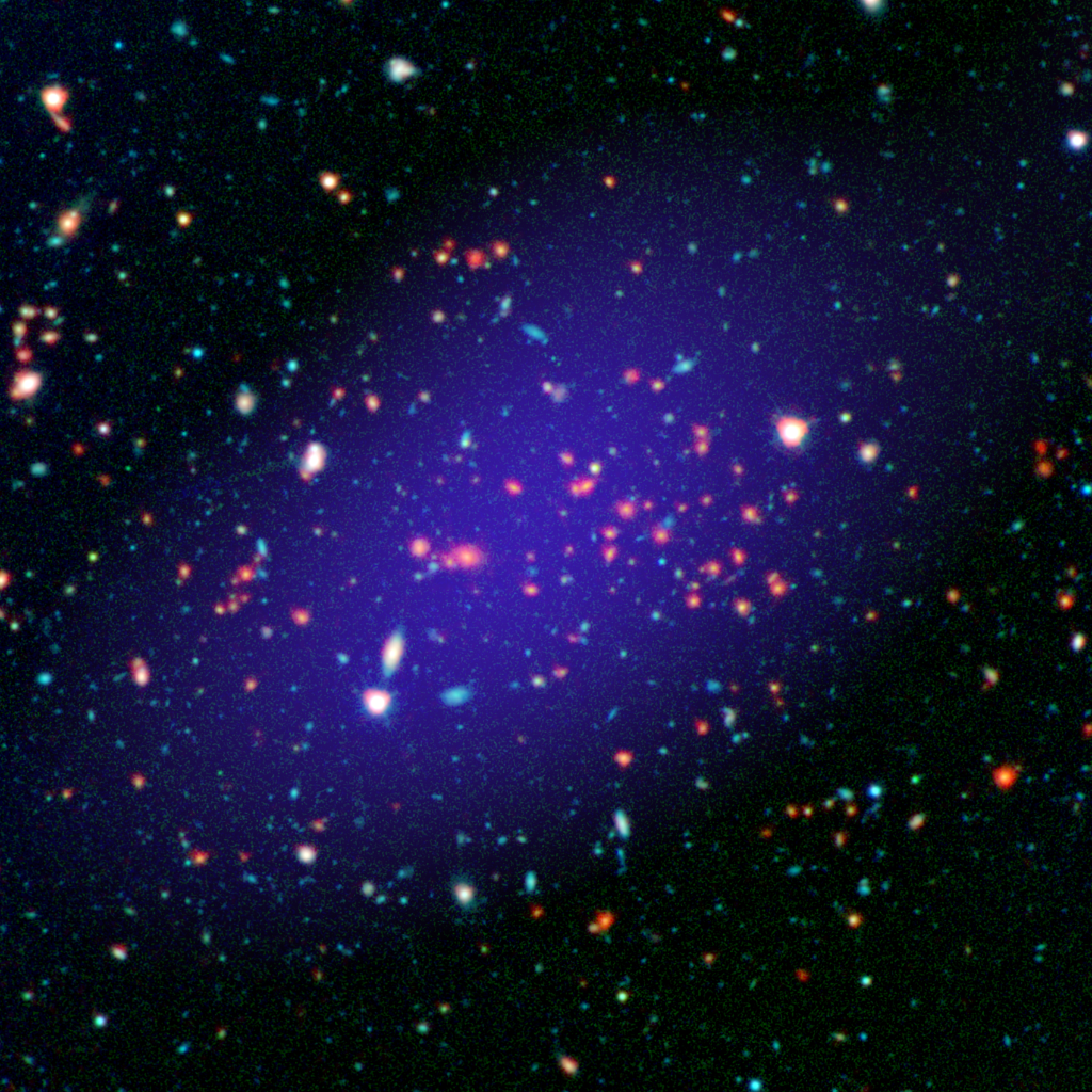 NASA's tweet photo. A whopping gathering of galaxies has been found in a remote part of the universe. Details: https://t.co/KVgzA8h6QZ https://t.co/3EJ3cMogTj