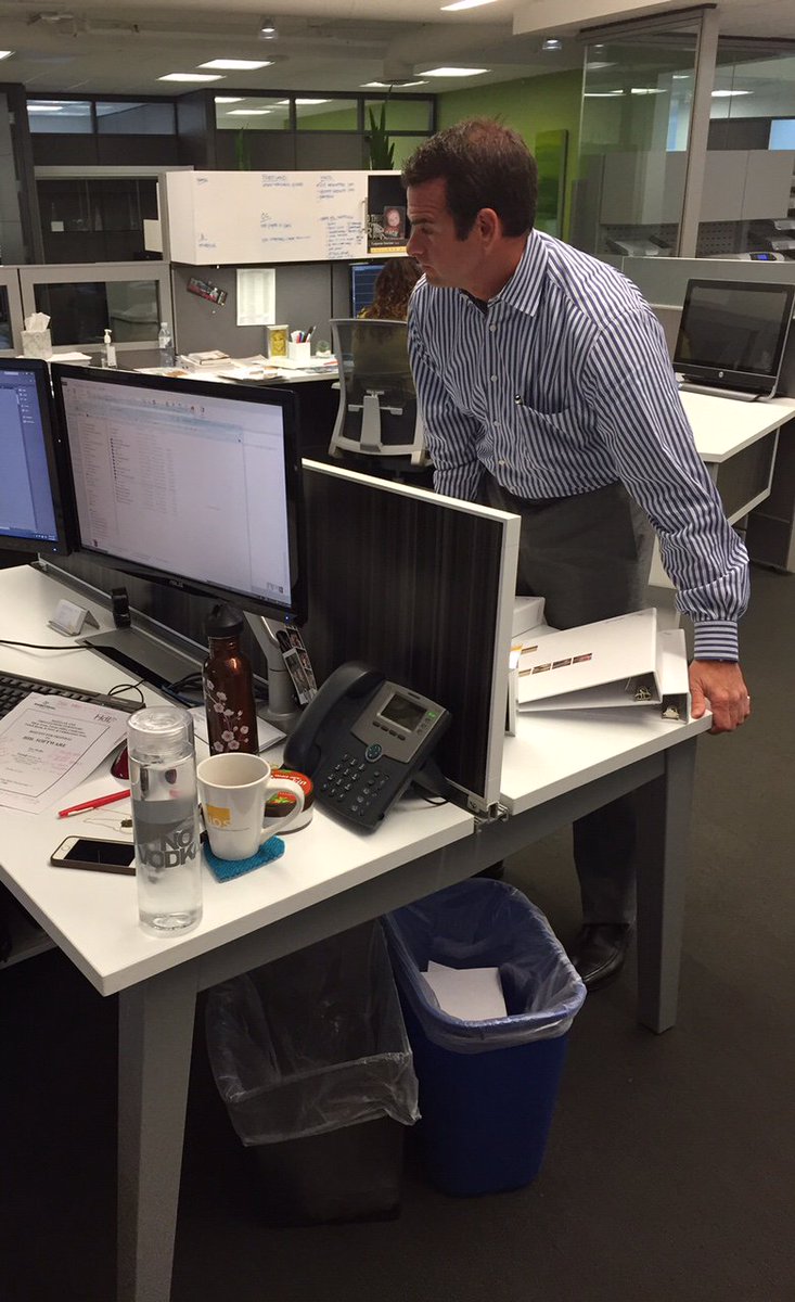 IOSdealership's tweet photo. Our principals are hands on! Brian Airth adjusts a workstation into proper alignment. #interiorofficesolutions https://t.co/wQqjD5KcNa
