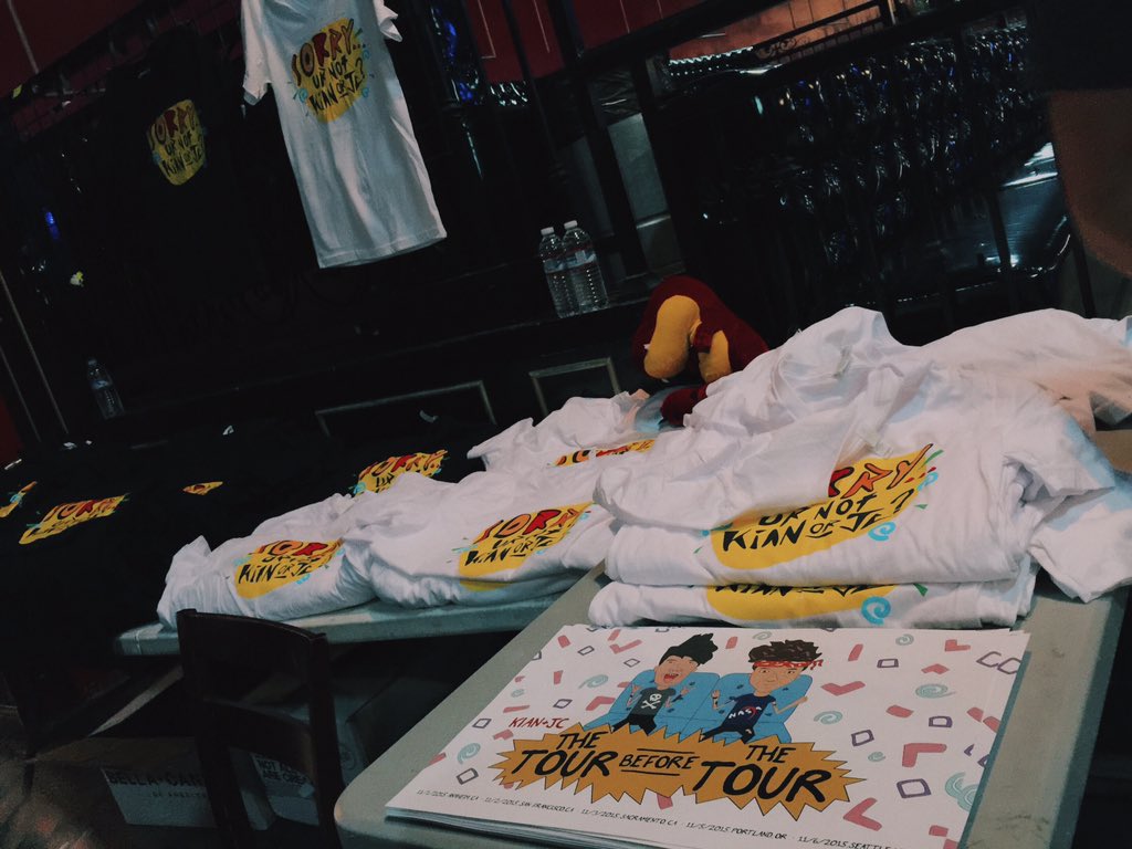 KianAndJc's tweet photo. Hey look over there!! Looks like a badass merch table.  Get a shirt or two, we'll sign em ☺️🤘🏼 https://t.co/WwzirLSEld