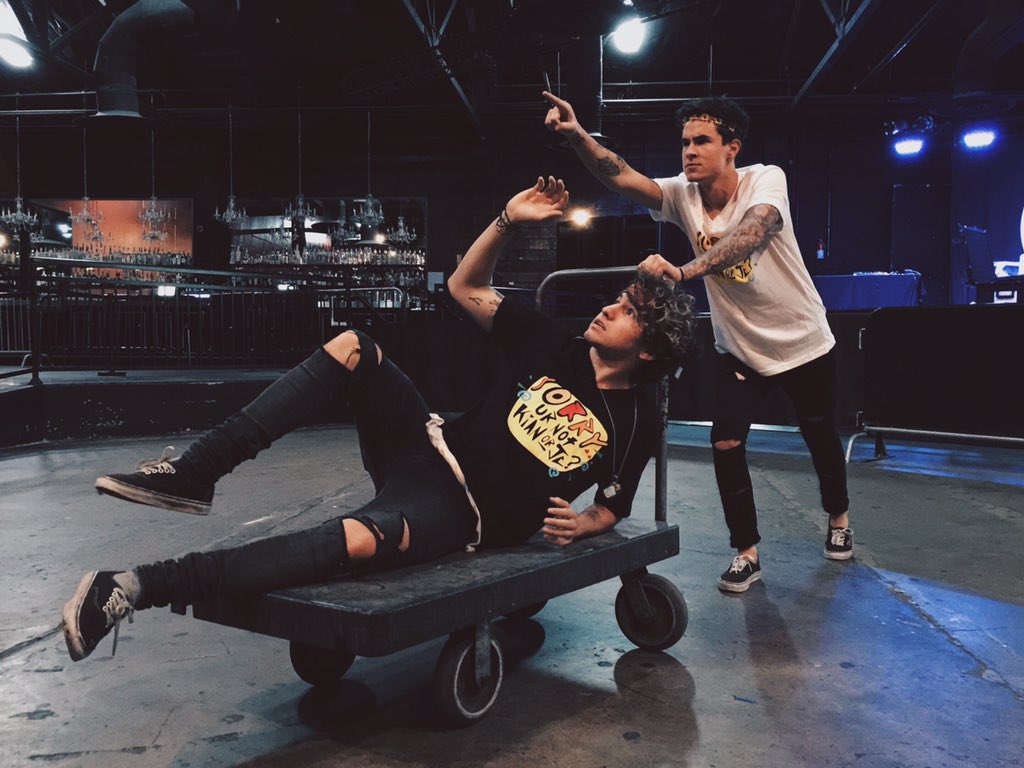 KianAndJc's tweet photo. Hey look over there!! Looks like a badass merch table.  Get a shirt or two, we'll sign em ☺️🤘🏼 https://t.co/WwzirLSEld