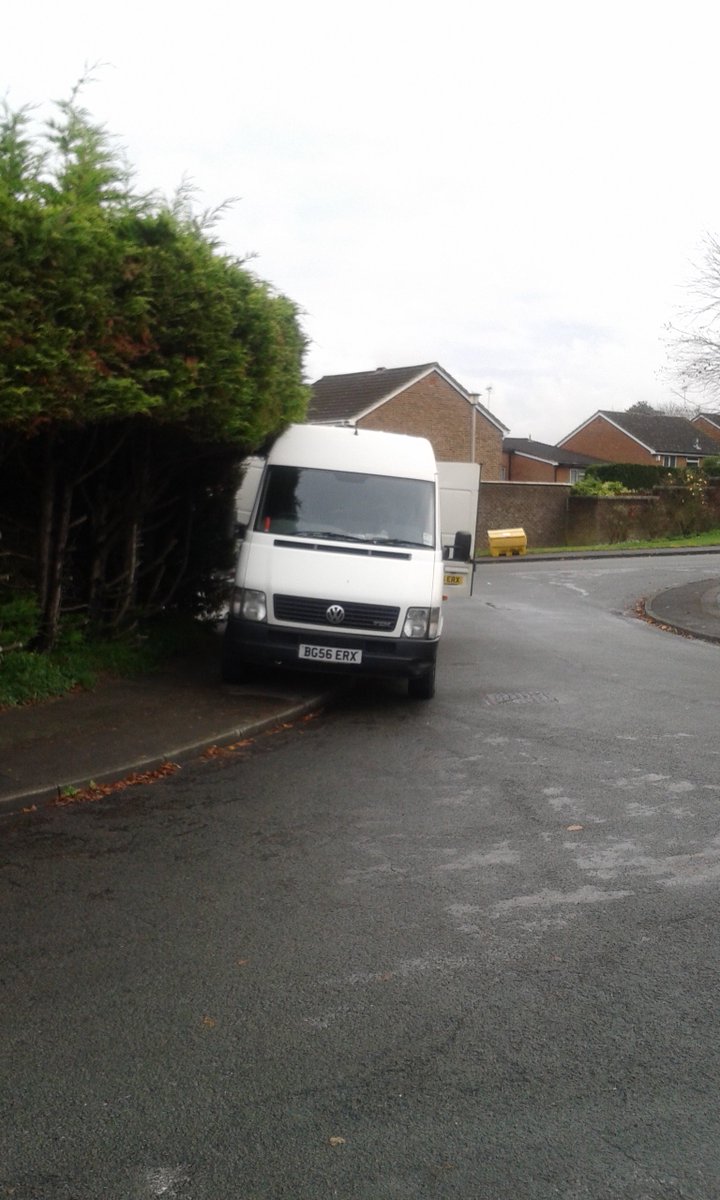 This isn't inconsiderate, it's dangerous. Doors open into traffic on a bend and blocking footpath. RG128YU <a href="/ThamesVP/">Thames Valley Police</a>
