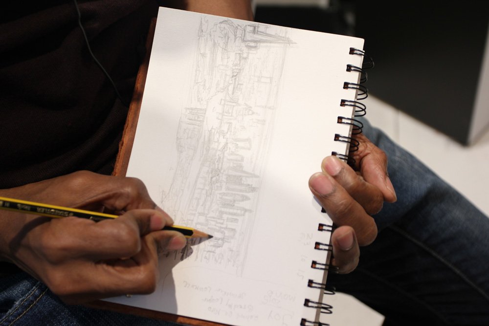 StWiltshire's tweet photo. Stephen sketching away in his gallery today for a new project #london #skyline #topsecret https://t.co/eaRwBSshgI
