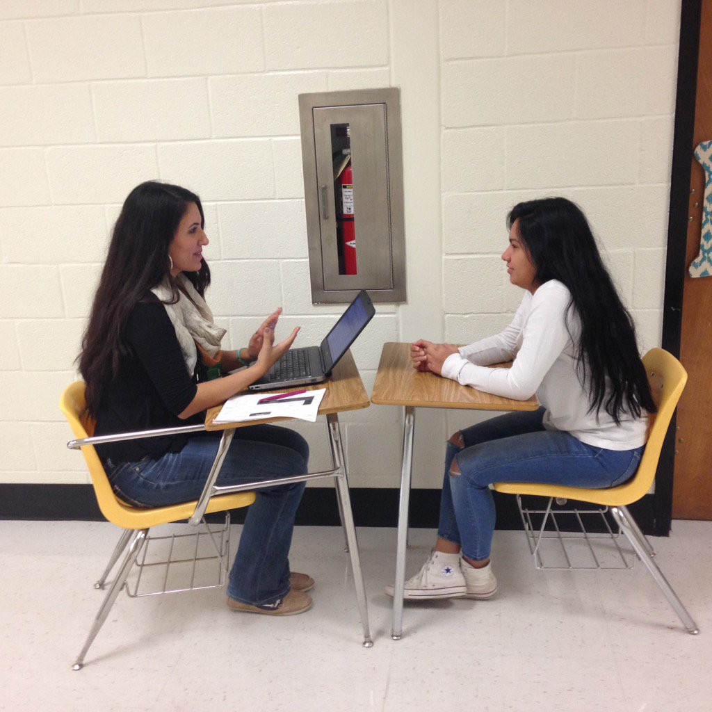 Jerome_Huff6125's tweet photo. English teacher Mrs. Bregeth is conferencing w a student while her students review for a test! #studenttrust https://t.co/xgdewtPlFE