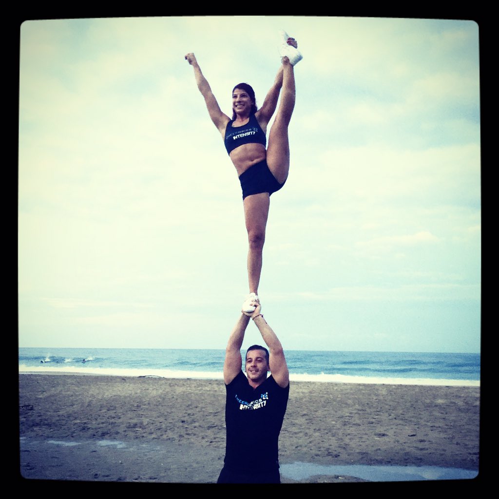 talktoshane's tweet photo. @Cheerobics INTENSITY™ Master Trainers stunting on the beach. #ThisIsINTENSITY https://t.co/QPeZKV3hA3