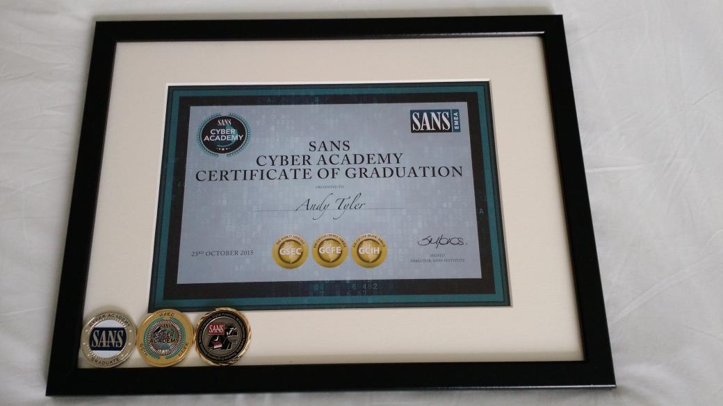 Finishing the #SANSCyberAcademy on a high! Three challenge coins including a gold for averaging 93.3% on my certs :)