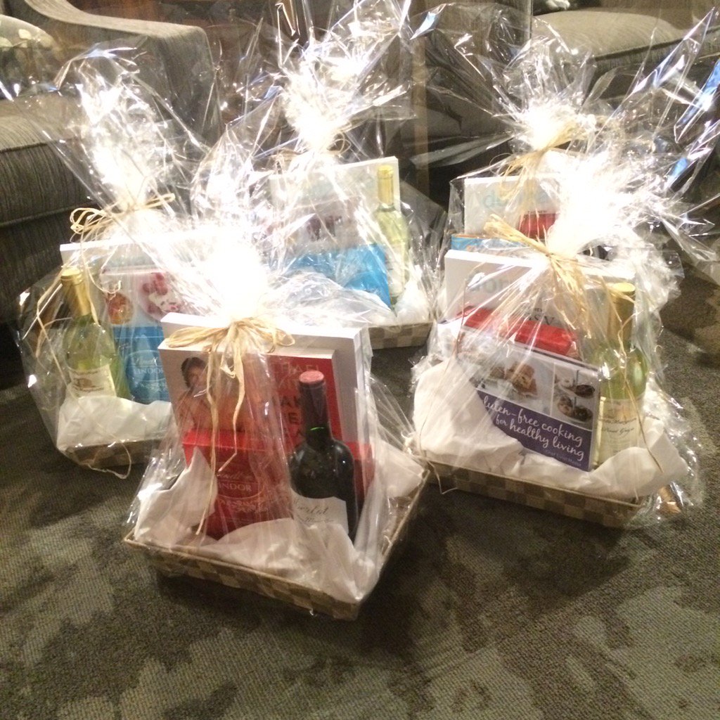 ONLibraryAssoc's tweet photo. Wonderful gift baskets. Thank you @LibraryBoundInc @HarperCollinsCa @SimonSchusterCA @penguinrandom #RedHotRA https://t.co/CNWScqdacZ