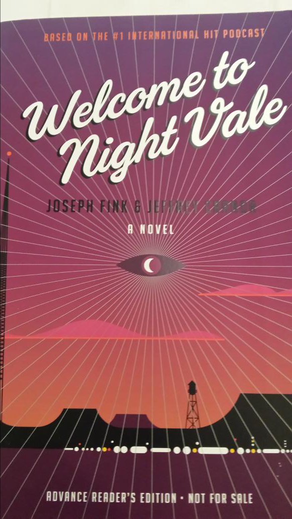 Auryn84's tweet photo. Ooh, lookit what I found at #RedHotRA ! Squee! This was on my (very long) to read list #LibrarianProblems #NightVale https://t.co/QR8r8Ccf4T