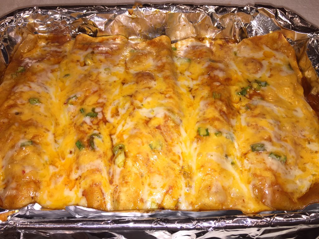khtqkc's tweet photo. Friday night #enchiladas with sauce based off of @Emeril's #recipe #riceandbeans #cheesy #spicy https://t.co/DNRJO5xfmI