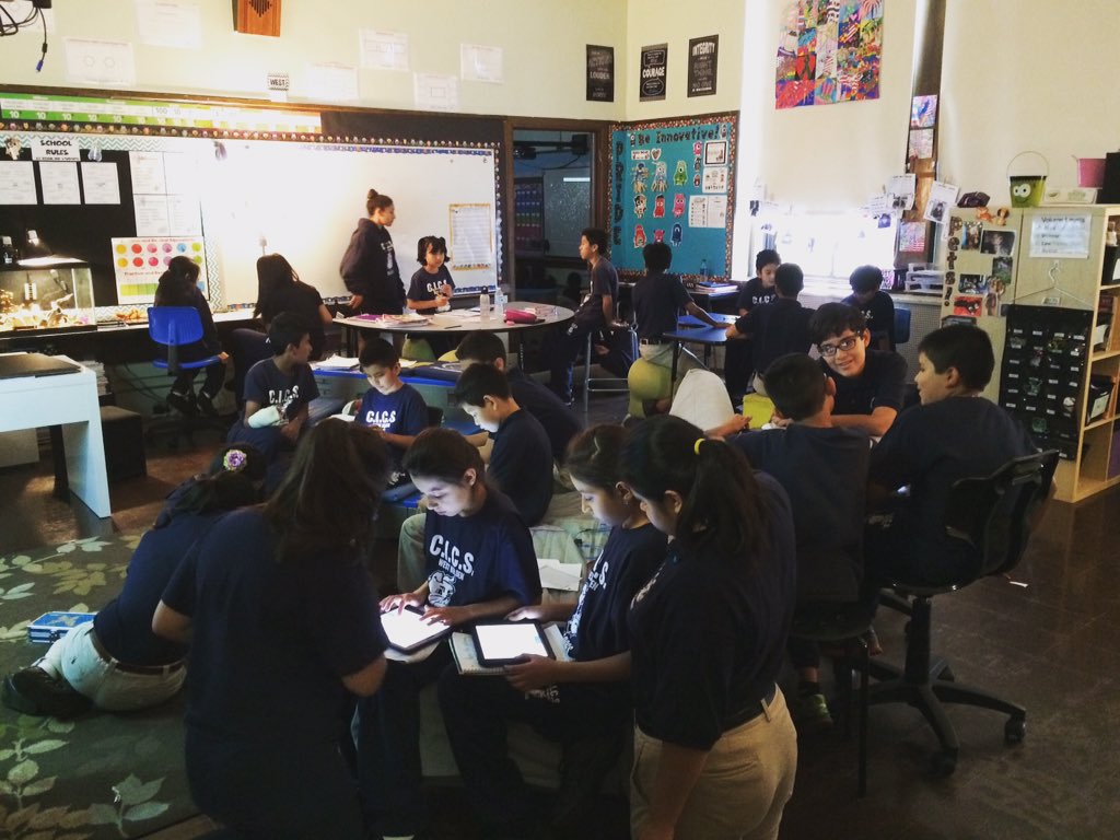Ms_Swick's tweet photo. 7th graders teaching 5th graders all about variables and hypotheses #science #collaboration #CICSWESTBELDEN https://t.co/hZPL4RLlpS
