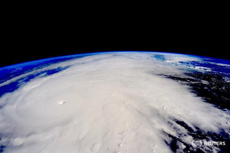 Reuters's tweet photo. Hurricane #Patricia is downgraded to Category 1 storm with winds decreasing to about 75 mph: https://t.co/00lJ8j2O7Y https://t.co/DJa8SOrd18