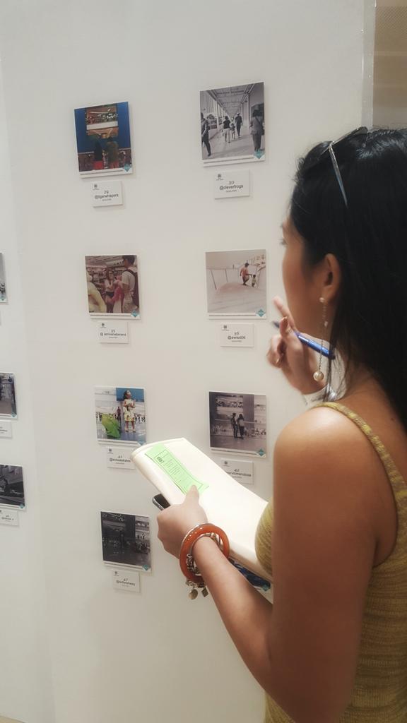 dsoshalnetwork's tweet photo. Faye voting for her favorite photo this afternoon at @IGersManila's exhibit 😊 #Pipe4 #IGMNL https://t.co/AtYo5w8QJi