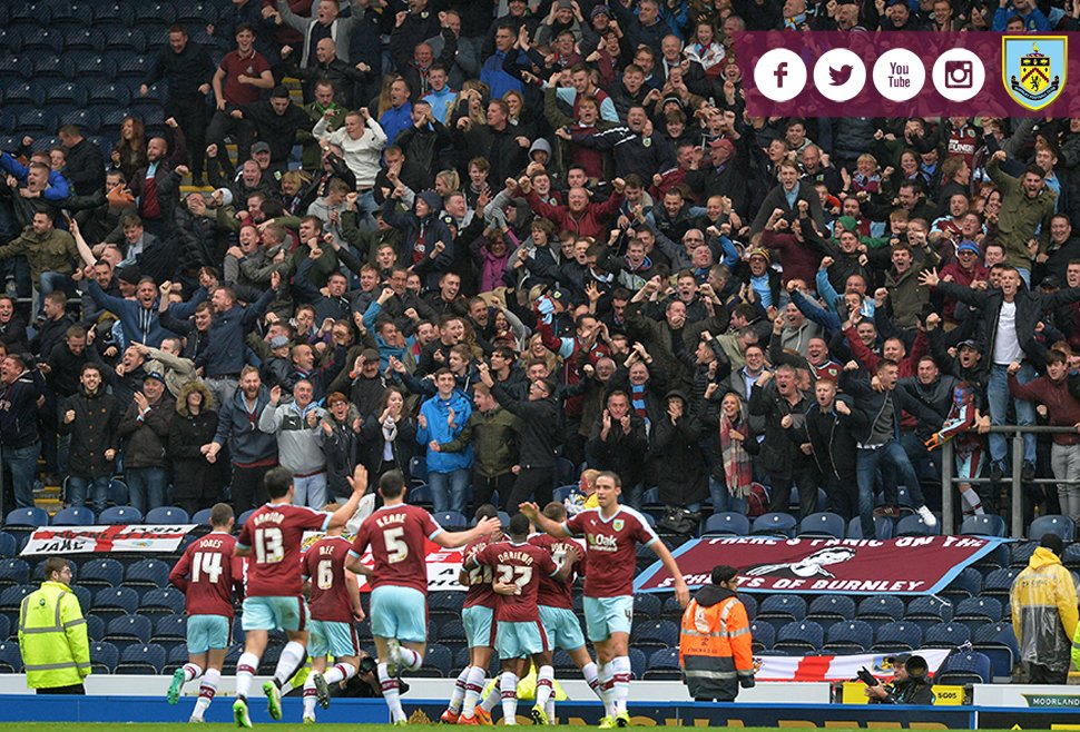 BurnleyOfficial's tweet photo. PHOTO: The Clarets celebrate in front of the Darwen End after Arfield's goal. 1-0 #ClaretsLIVE https://t.co/mmKg6bUmVB