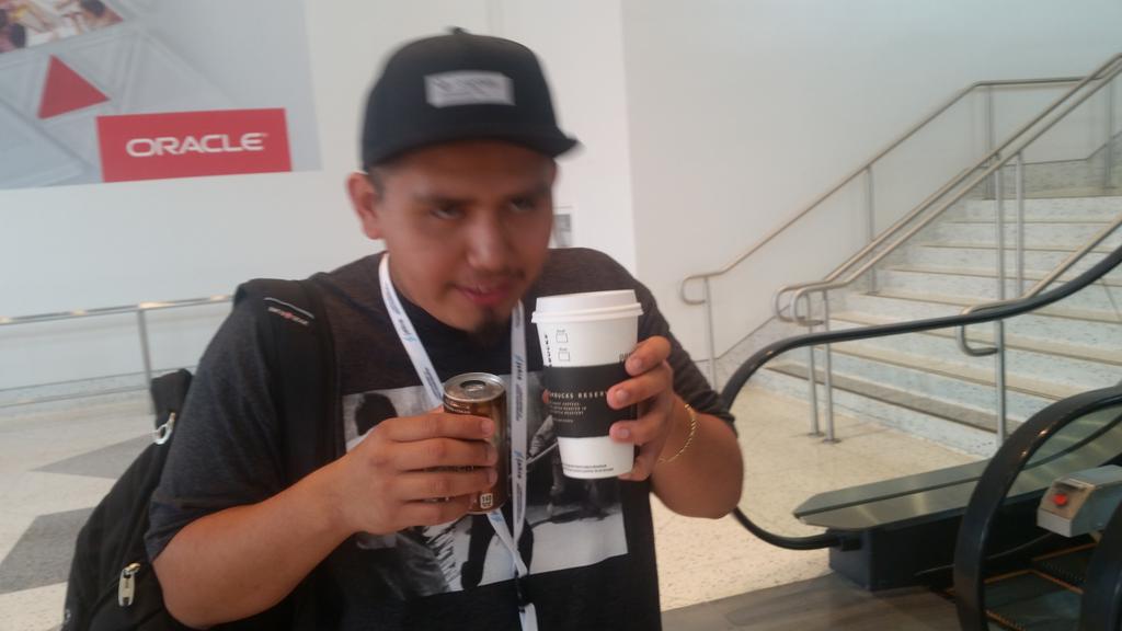 WeAreGameheads's tweet photo. Yes. He's drinking two cups of coffee at once. Getting ready for #javaone4kids at the Moscone Center. @UPbeatOKG https://t.co/occuaeQ2RD