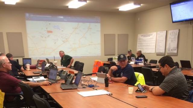 NBCERT's tweet photo. #NBCERT working in #EOC with City of New Braunfels staff. #webeoc @DobieAcres @NBEMC picture by @nbpio https://t.co/WdJVyK0t2c
