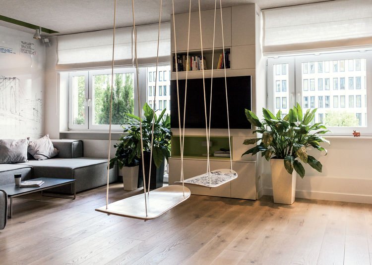 dwell's tweet photo. This tiny Warsaw apartment instantly changes from office to playroom: https://t.co/PKqt6LZpb2 https://t.co/1dAhhzU0B9
