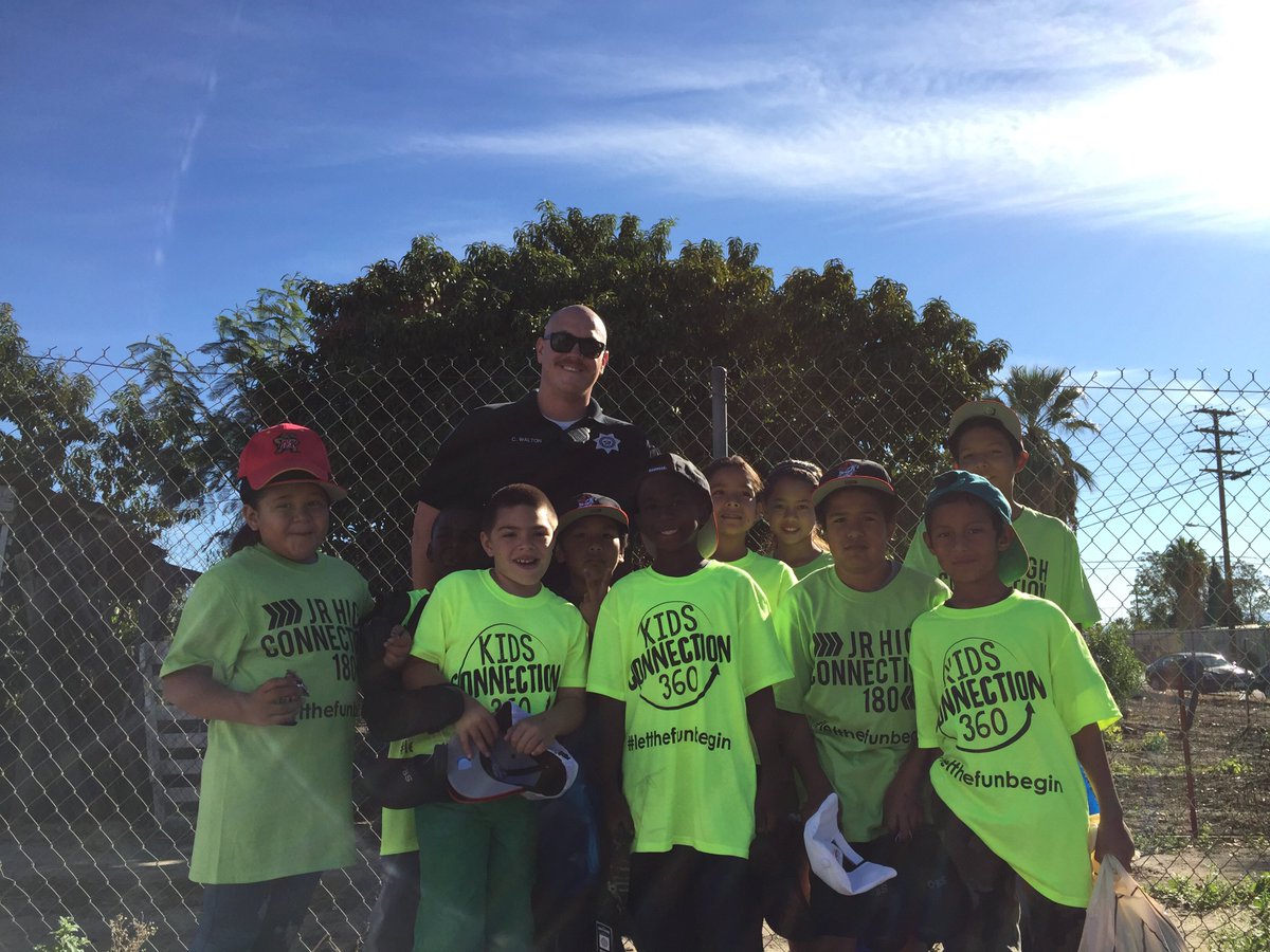 Officer Walton from <a href="/SanBernardinoPD/">San Bernardino PD</a> with a few of our guests. Shoes for every kid here