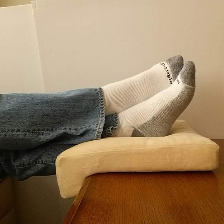FeetUpdotcom's tweet image. FeetUp in use. Convert your coffee table to an ottoman.