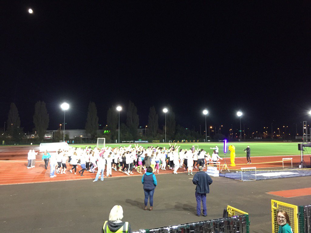 H_Rowlatt's tweet photo. Glow runners getting warmed up by @JoshMaddenPT #GlowNeon @RNIBCymru https://t.co/Zkn8hynXoY