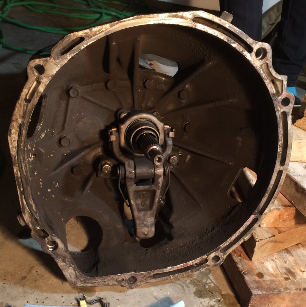 All clean! Two cans of WD-40 and a roll of shop towels later the bell housing is finally grease free.