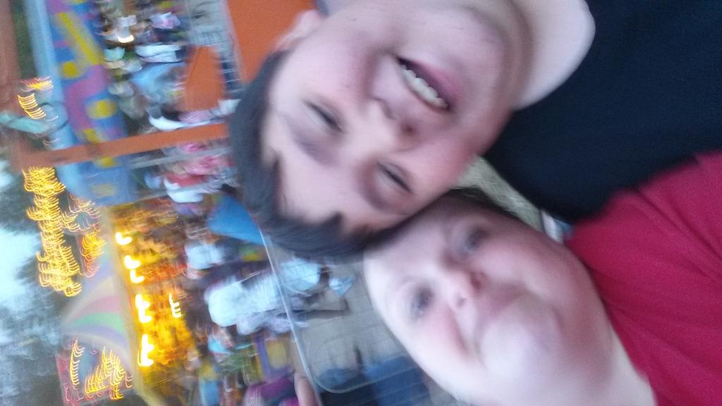 Me &amp; my Godson on a ride at the fair.