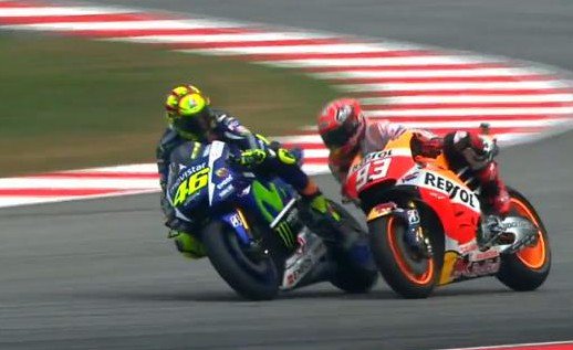 crash_motogp's tweet photo. Rossi looked at Marquez then took him down! Will Rossi be penalised? #MalaysianGP #MotoGP race https://t.co/hwzdxv9aoy