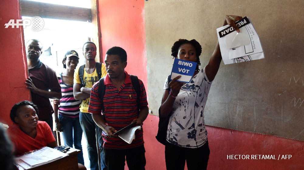 afpfr's tweet photo. Haïti: élections cruciales pour la stabilisation politique https://t.co/dzsqbwLh4f #AFP https://t.co/J9mC1QZLkV