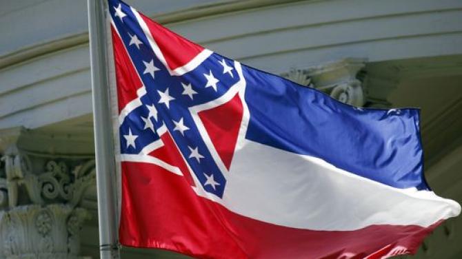 TheRoot's tweet photo. Ole Miss students and faculty vote to remove the state flag from campus. https://t.co/Sc3ZK6joiY https://t.co/olIUHxKKpl