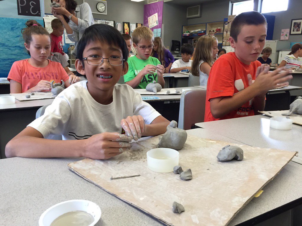 Syfifthgrade's tweet photo. Making pinch pot monsters out of clay #room1 https://t.co/QdKVkMnhvR