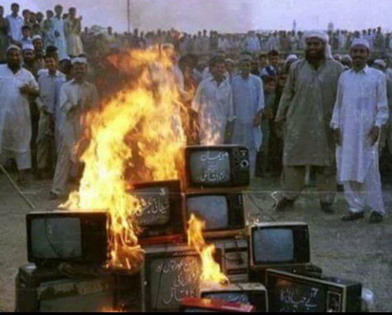 JihadistJoe's tweet photo. Today we burn evil infidel technology &amp; take photo of it with our smart phones.... https://t.co/jneQDA480t