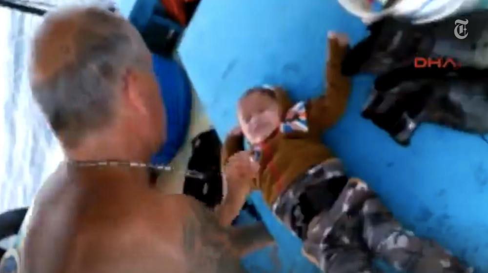 nytimesworld's tweet photo. Video of Turkish fishermen saving a migrant baby from the sea https://t.co/JOunJ2mJfK https://t.co/UlJRH5eECc