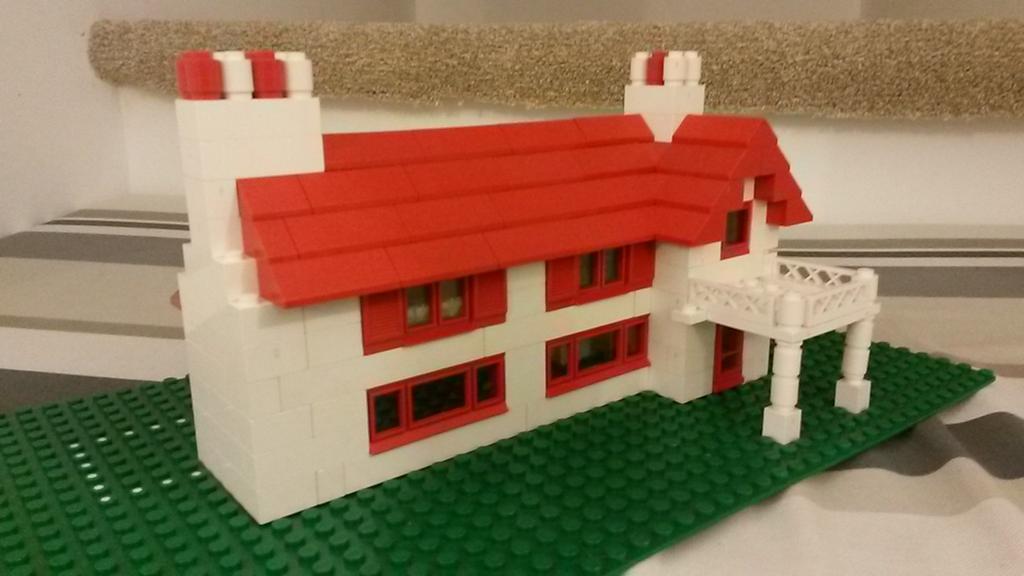 QuantumPA's tweet photo. @BenAdamSmith @ElrondBurrell When 1 architect &amp; 1 non-architect parent are asked to build a quick #Lego house! https://t.co/f0NMKzZul5