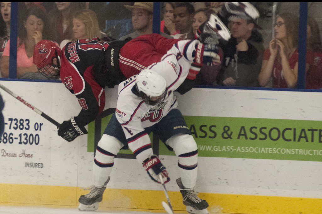 LibertyHockey's tweet photo. Relive the hit of the year thrown by #4 Steven Bellew! (photo by Paul N. Kim) https://t.co/ltaIfKkYlT