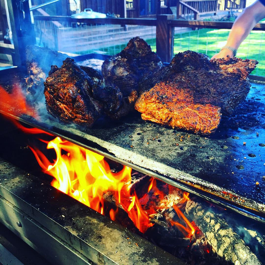 GuyFieri's tweet image. Pit beef on the grill