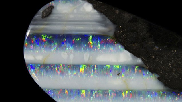 WORLDMARKETGEMS's tweet photo. #Opals in thin fractures in basalt from Honduras commonly show banding that marks the horizontal level. #opalgem https://t.co/GPeASbd8vU
