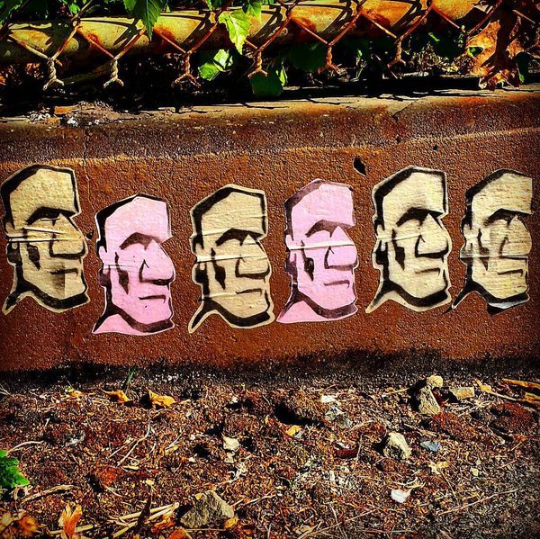 PasteUpArt's tweet photo. Coloured #wheatpaste heads! @GraffitiFeed Potentially inspired by Easter Island? Photo: @damers2ma #streetart #art https://t.co/qWWMfkJbyY