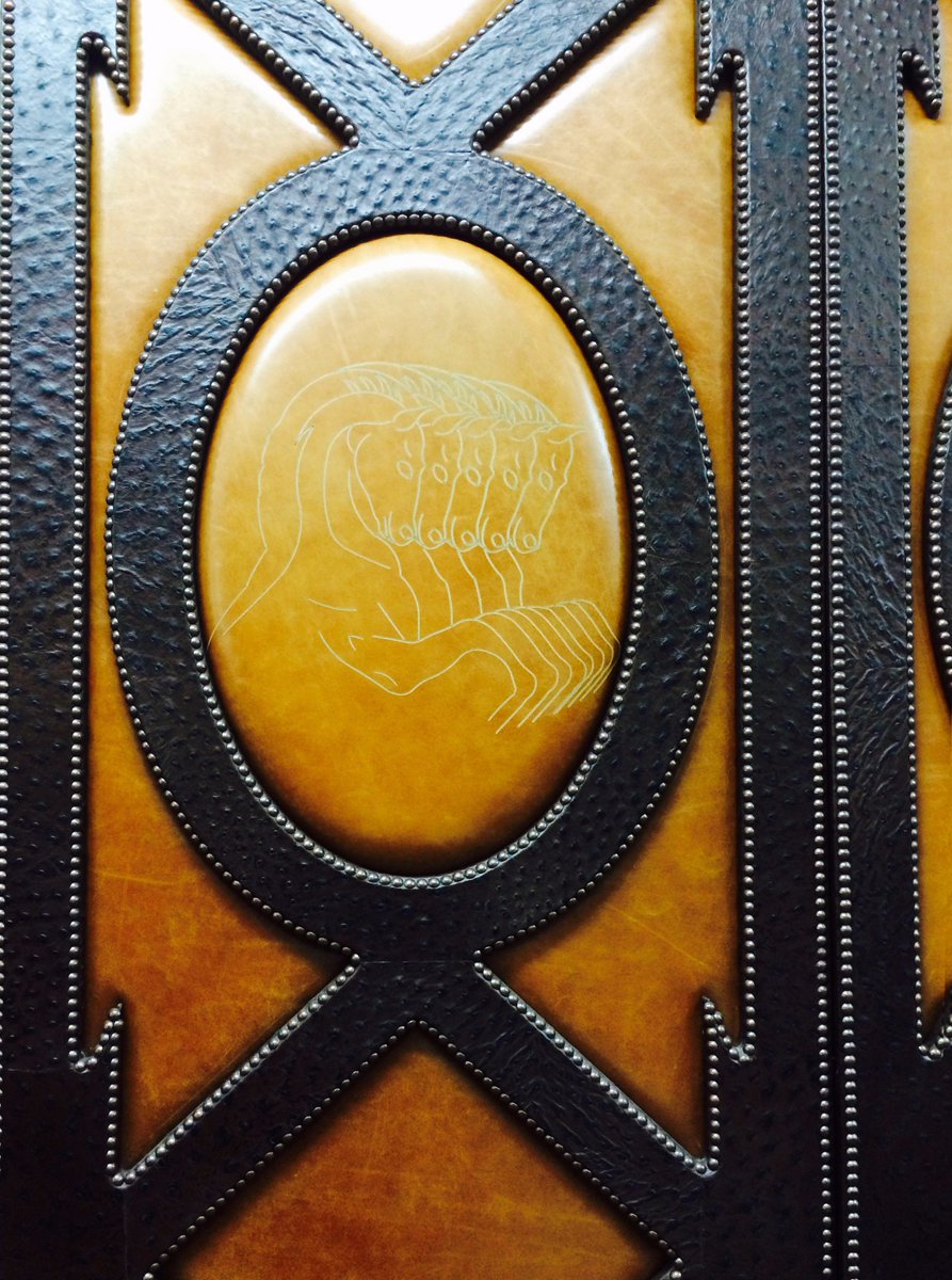 Alma_1938's tweet photo. Horses etched on ostrich leather panels in ALMA Head office at Whitechapel #AlmaLeather #leatherpanels https://t.co/HR63DN89vM