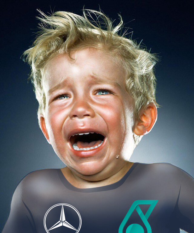 Candid behind-the-scenes pic of Nico Rosberg's reaction to Hamilton's 3rd World Championship...