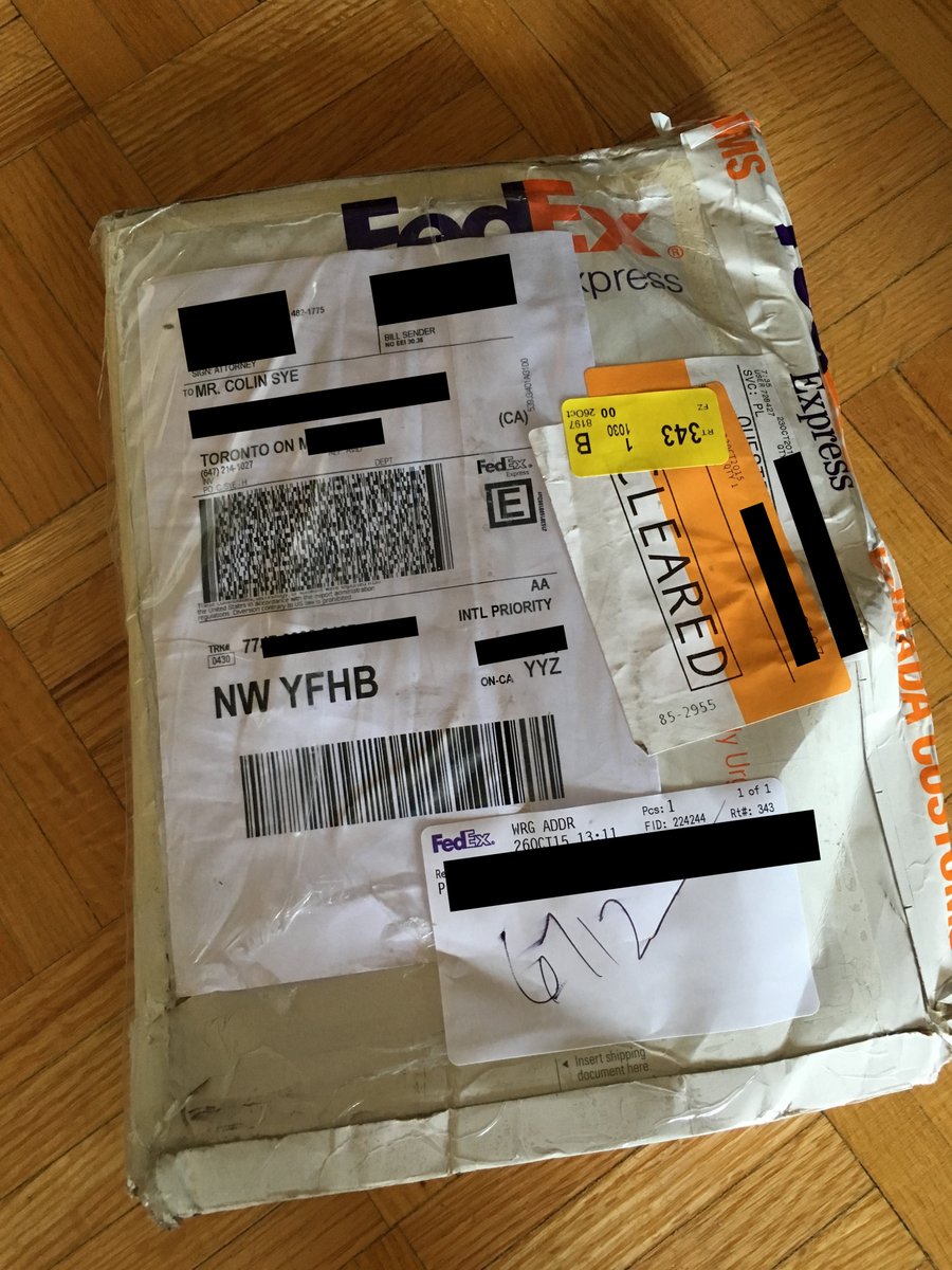 ColinSye's tweet photo. Solid job getting my work visa extension to me @FedEx @FedExHelp, soaking wet and looking like it got run over. https://t.co/XZDHSupWiR