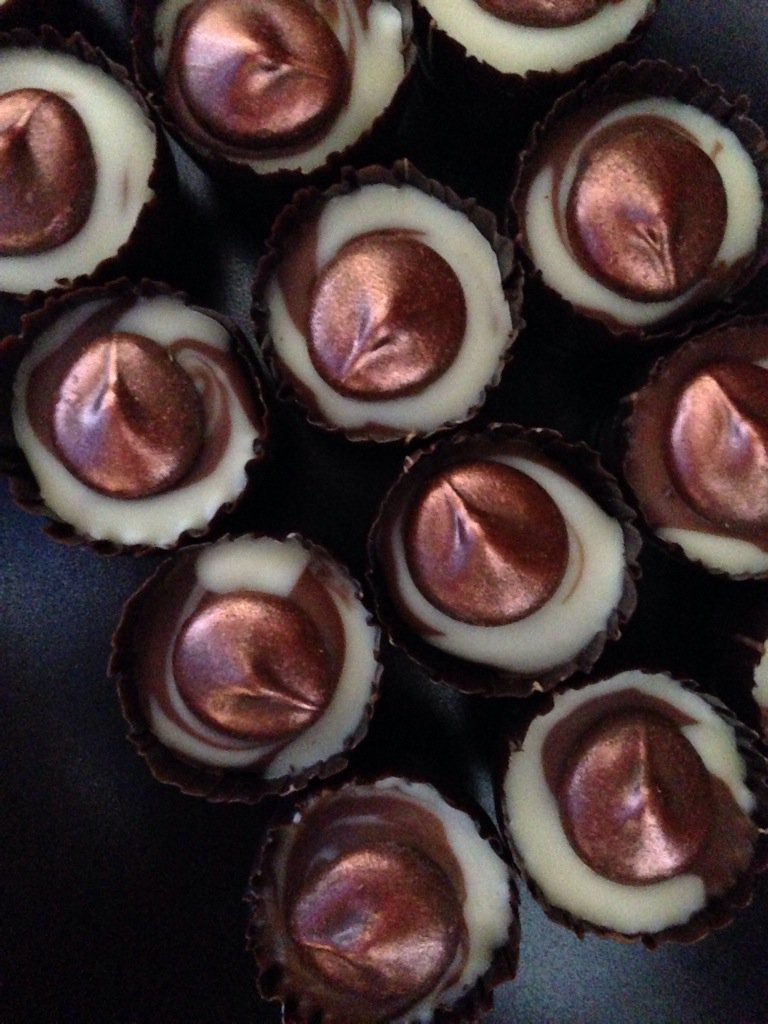 temptedby's tweet photo. A very popular chocolate choice - A cup of coffee... Kahlua ganache, and cappuccino drop on the top - delicious ;) https://t.co/vgnGi01t4i