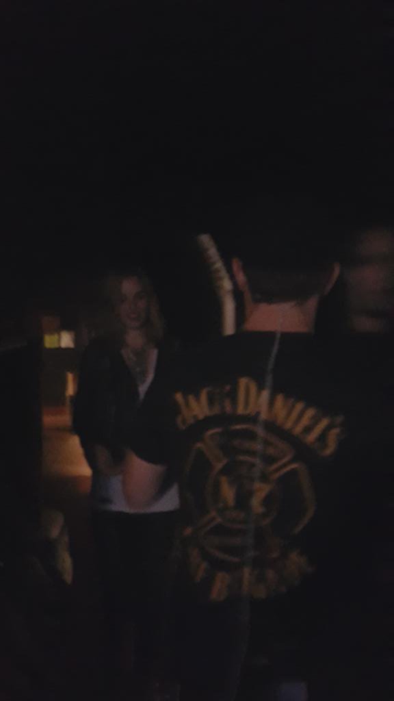 amster87's tweet photo. My friend Ben(Halestorm guitar tec) handing Lizzy her guitar. @LZZYHALE @Halestorm https://t.co/LeNQyF689p