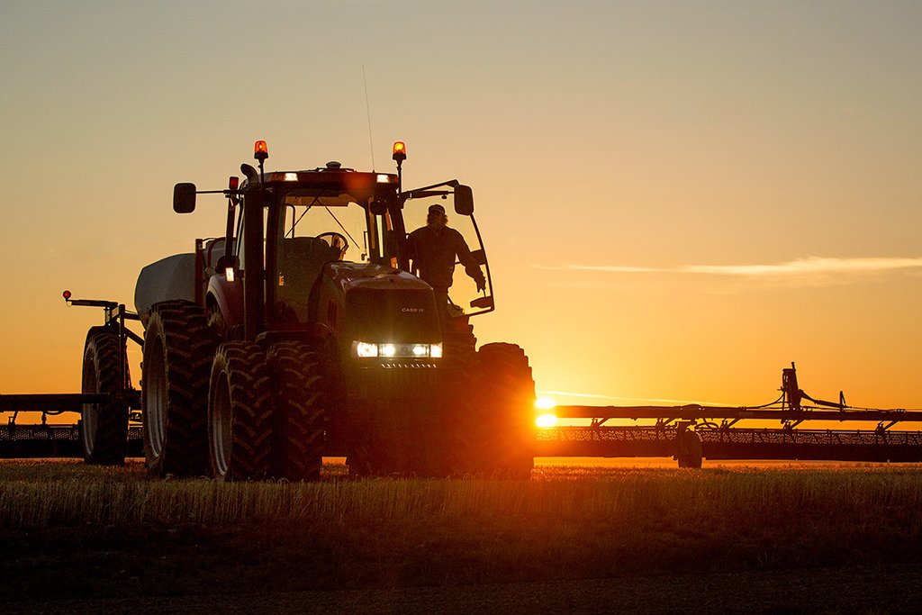 Todd_Klassy's tweet photo. A farmer getting into his @Case_IH tractor to spray crops on a farm north of Havre, #Montana. #farmpics #agriculture https://t.co/p9qYUxBCq6