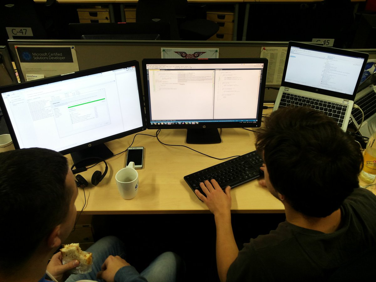 _kafex's tweet photo. Pair programming in progress - "I eat, you code." :)  #SabreHack #YOLOTeam https://t.co/0QR8eYAKZk