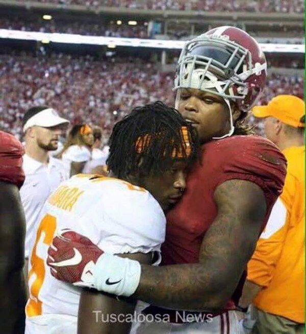 CecilHurt's tweet photo. Our photographers did a great job here. Derrick Henry and Alvin Kamara sharing a moment bigger than any game. https://t.co/8IYkSVGs3z