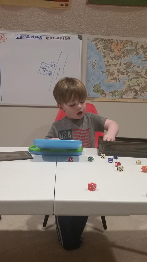 JaimJaim84's tweet photo. Starting him out early! #tabletoprpg #shadowrun #dice #nerdyparenting #nerdmom https://t.co/GOhxrvaa7P