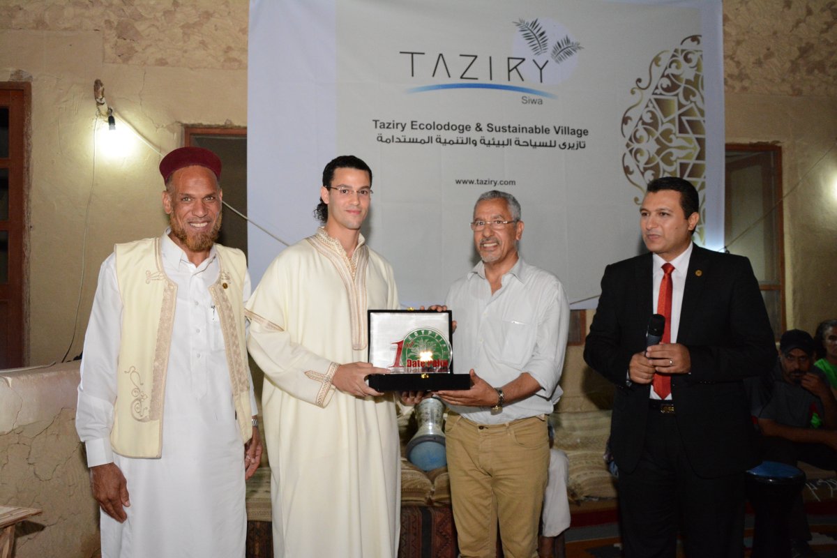 Taziry's tweet photo. Awarded a trophy by the #KIDPA @ The First Egyptian Date Palm Festival in Siwa... https://t.co/ejp0yIucxT