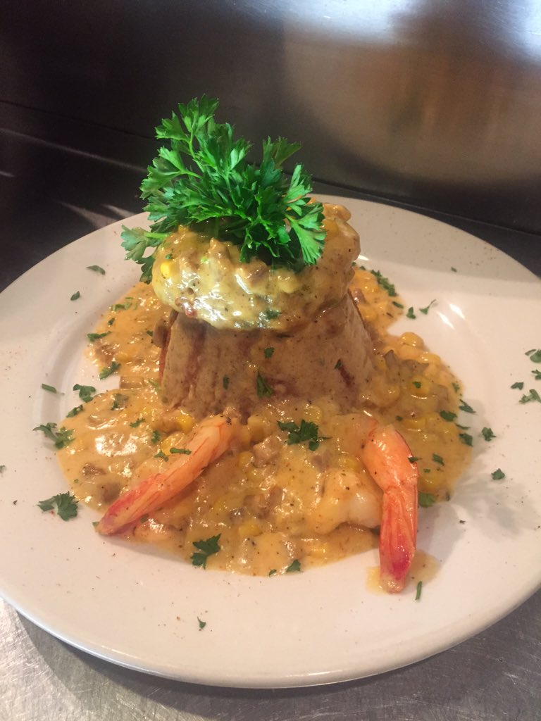 CoffeeRani's tweet photo. Grilled crab cake a top of corn bread topped with roasted corn and smoked andouille cream sauce. https://t.co/2CpgHQGFkU
